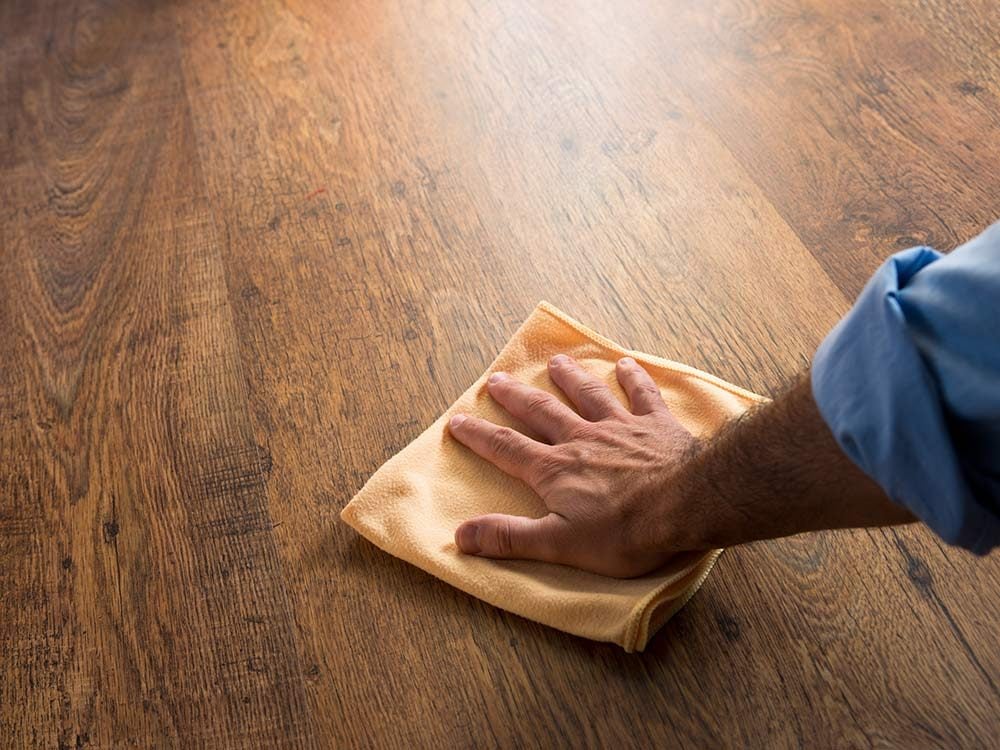 Man waxing floor