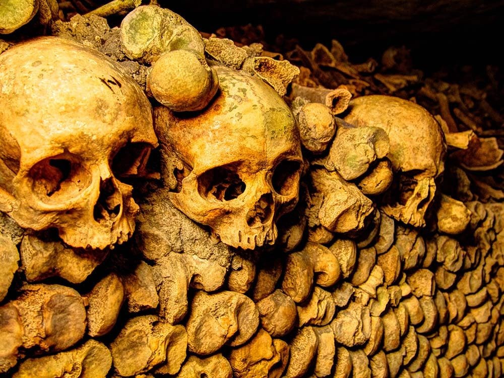 The Catacombs of Paris is one of the spookiest Paris attractions