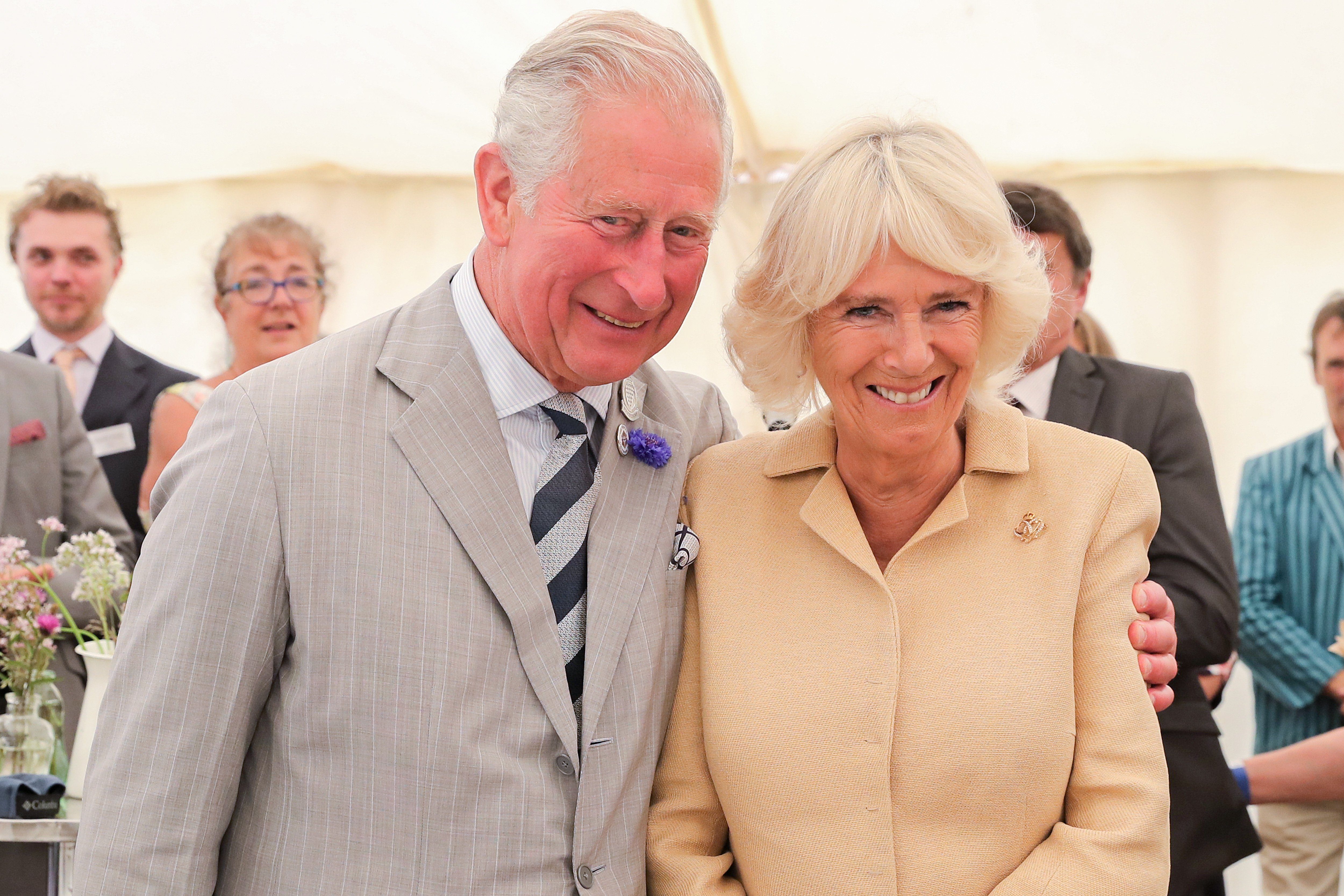 Mandatory Credit: Photo by Shutterstock (10340035bg) Camilla Duchess of Cornwall is sung Happy Birthday by Prince Charles and the crowds gathered at the National Parks Big Picnic celebration in honour of all 15 of the UKs National Parks, during an official visit to Simonsbath, England. Held in Exmoor National Park the picnic marks 70 years since they were created by the 1949 National Parks and Access to the Countryside Act. Royal visit to Somerset, UK - 17 Jul 2019