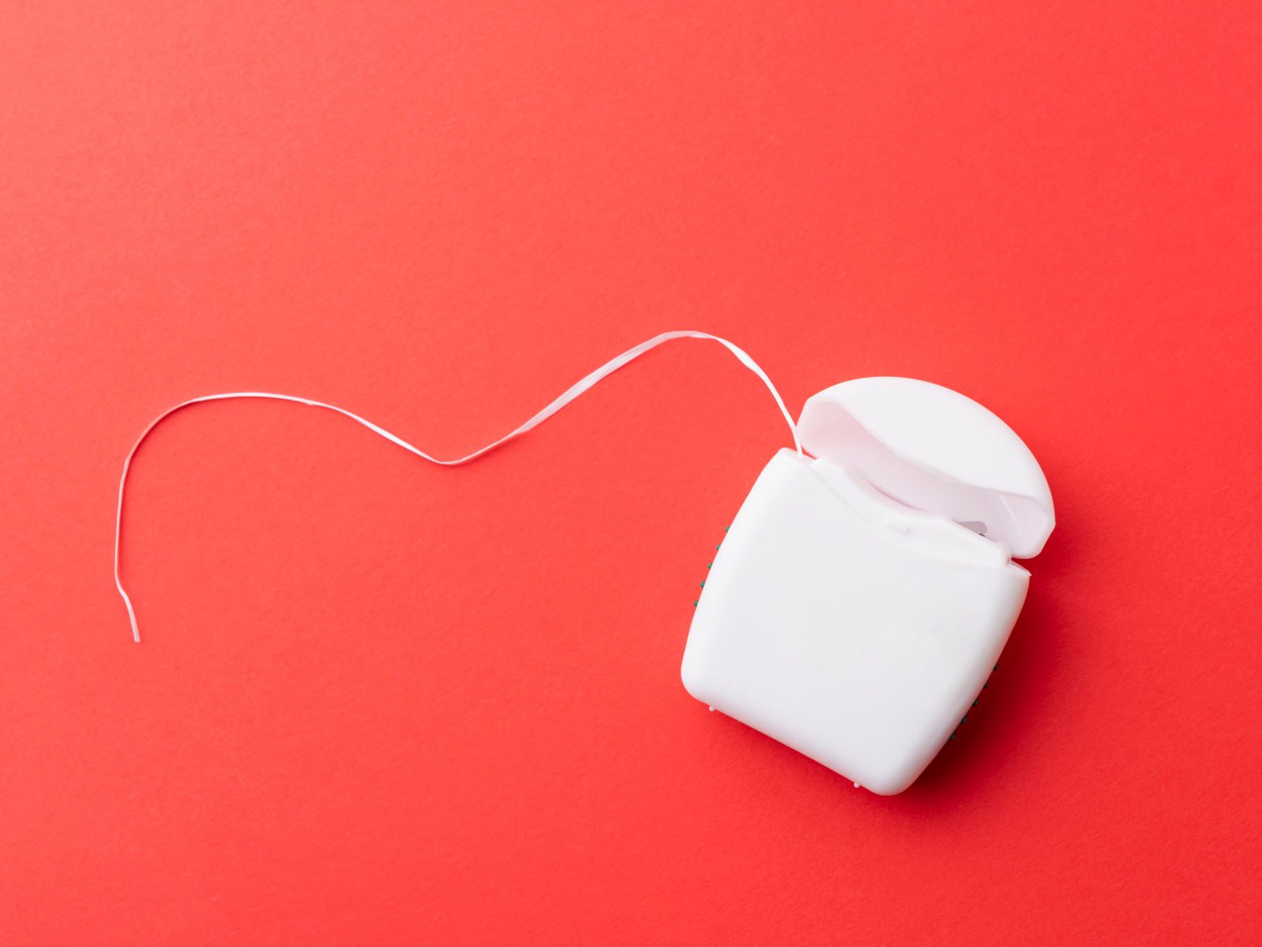 Floss Pick vs. Regular Floss: What Dentists Recommend | Reader's Digest