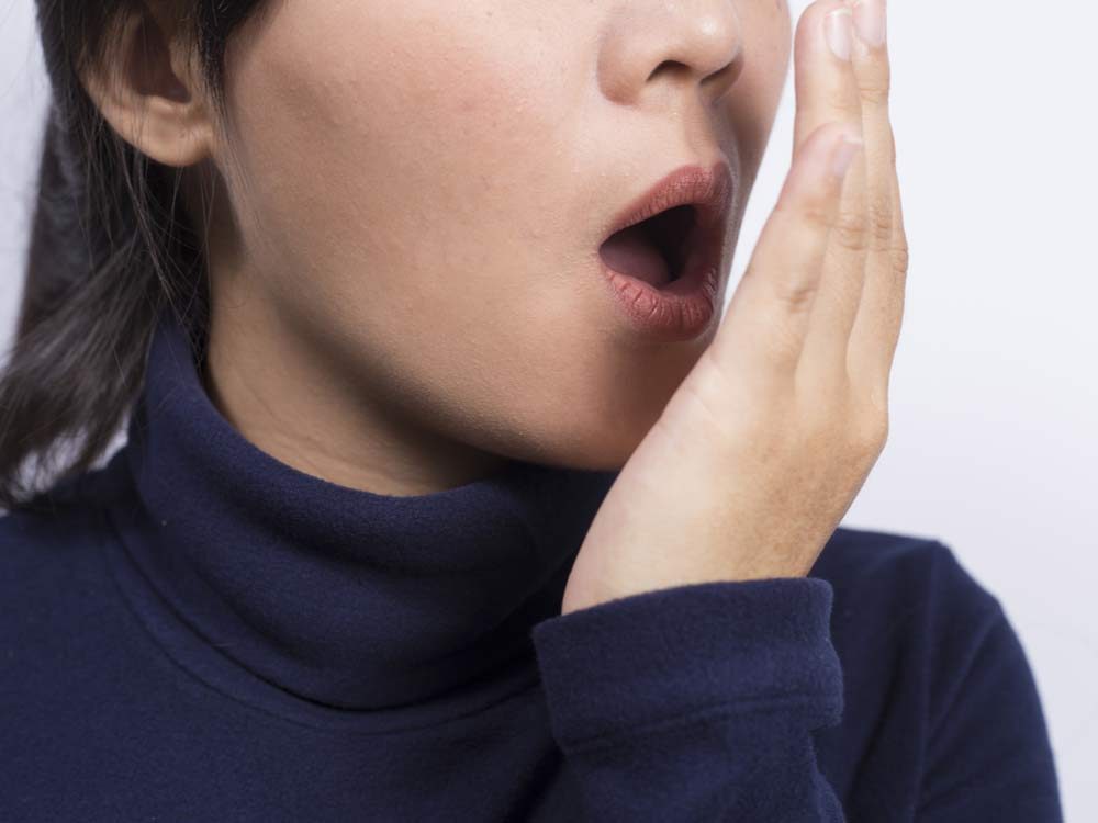 The Easiest Cure For Bad Breath According To A Dentist
